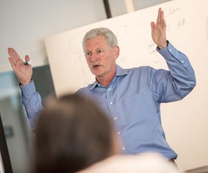 professor teaching in classroom